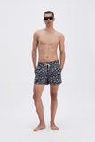 Black Swim Shorts with 'Mexican Birds' print, a stylish collaboration by Marion Deuchars.