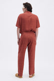 Terracotta Iconic Pants with 'Leone' print, a stylish collaboration by Uberta Zambeletti.