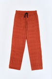 Terracotta Iconic Pants with 'Leone' print, a stylish collaboration by Uberta Zambeletti.